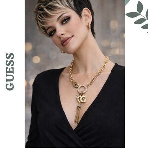 Guess Gold Tone Rhinestone Charm Tassel Necklace